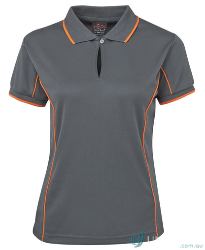 Gray JB’s Ladies Podium Piping Polo with orange trim for staying cool and stylish