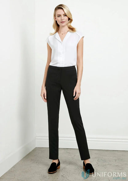 Stylish woman in white blouse and black options with ladies remy pants from Biz Collection Ladies