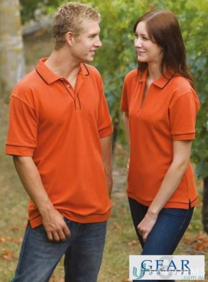 Matching orange polo shirts from Ladies Retro Waffle Polo with navy, black, and white options