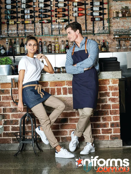Two restaurant workers in uniform showcasing Ladies Riley Chino Pant for a stylish look