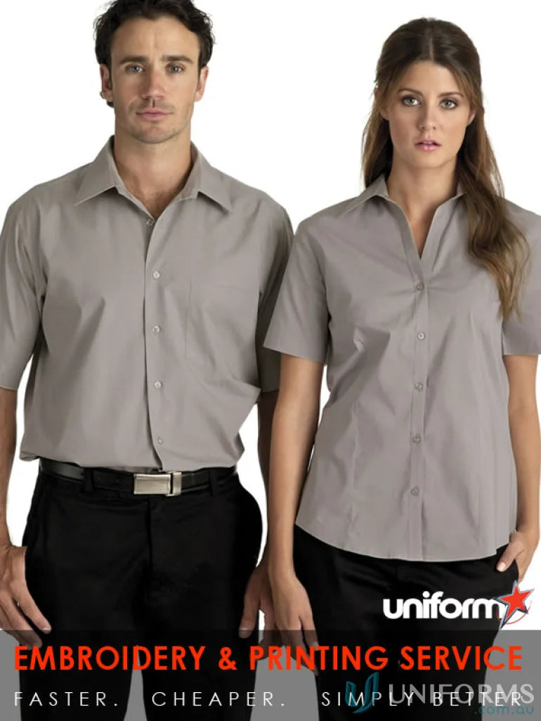 Ladies Rodeo S/S Shirt uniforms for workwear, shown on two models in grey shirts and black trousers