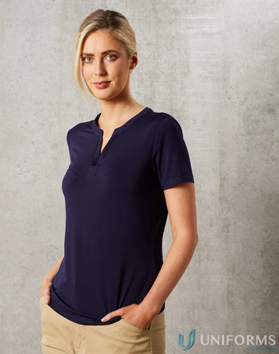 Woman in Sofia Ladies Knit Top with inset V-neck tab, showing winning spirit ladies style