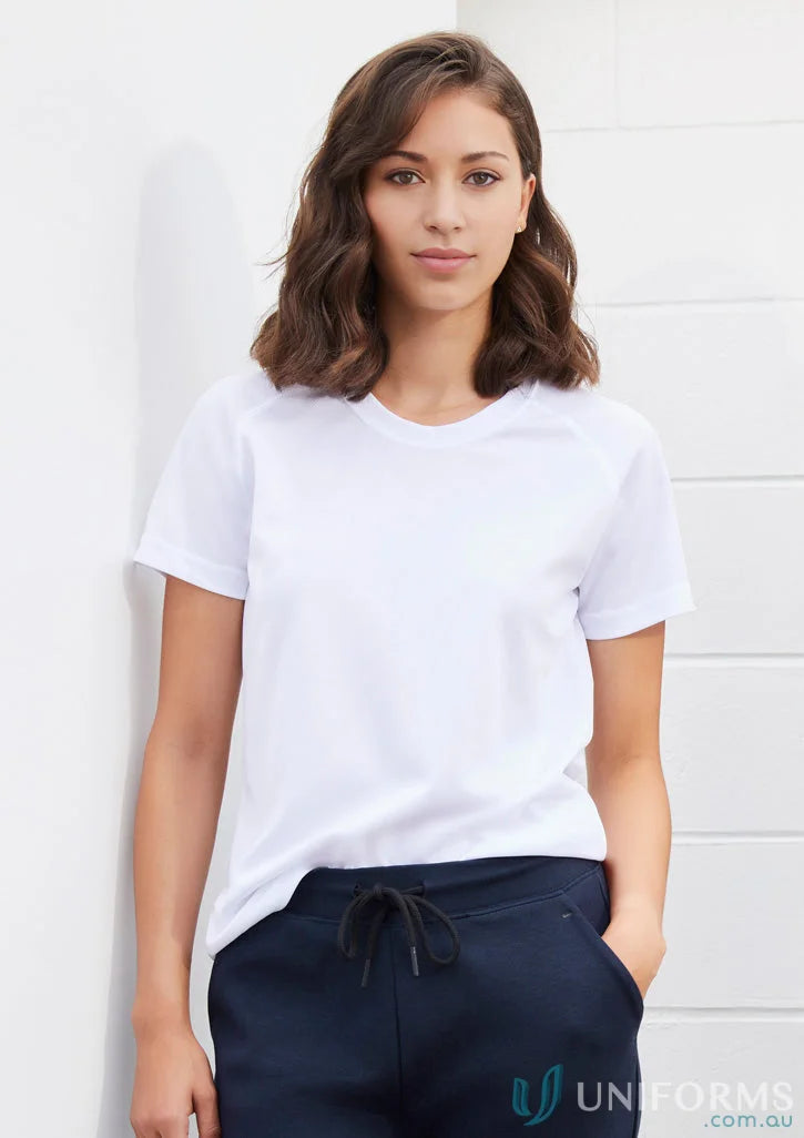 Lady in white T-shirt and navy pants wearing Ladies Sprint BizCool Tee, comfy and stylish