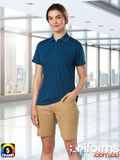 Woman wearing Ladies Stretch SlimFit Boston Shorts in blue polo and khaki shorts