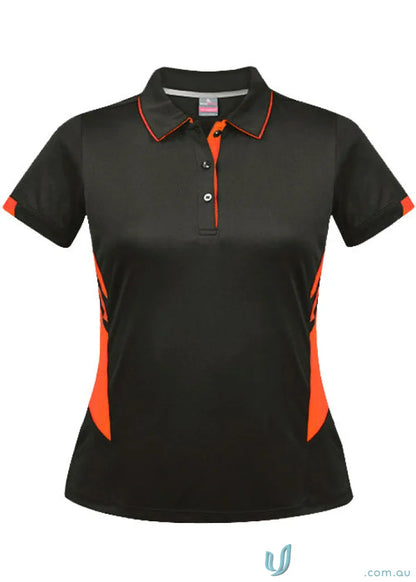 Black Ladies Tasman Polo with orange accents on collar, sleeves, and sides