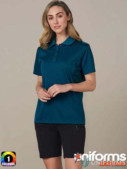 Lady wearing teal ladies utility cargo shorts with elastic waist for comfort