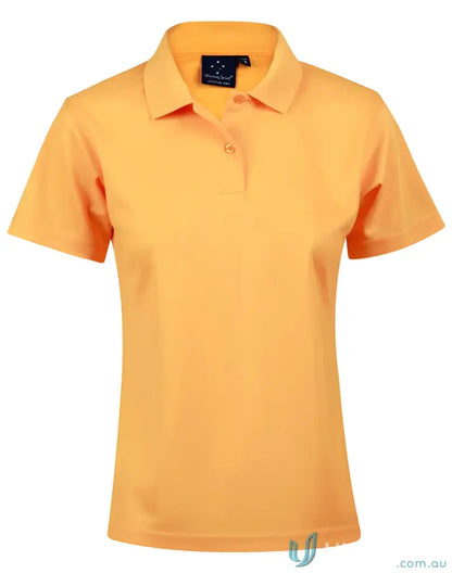 Ladies Verve Polo in orange with two buttons, made from CoolDry® polyester mini