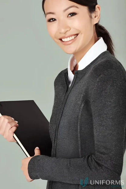 Smiling woman holding a black ladies zip cardigan for a stylish look