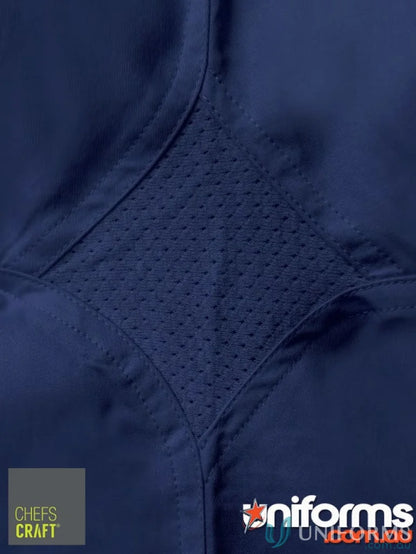 Close-up of dark blue vented cotton drill fabric with breathable diamond mesh panel