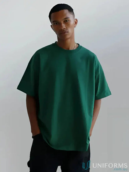Dark green oversized tee with an oversized fit, perfect for casual uniforms