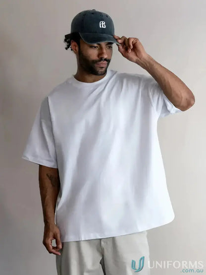 White oversized tee with comfy oversized fit, perfect for casual uniforms and fashion