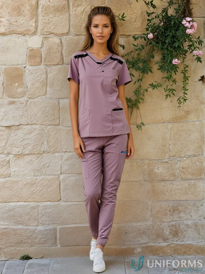 Medi8 Ladies Scrub Top in mauve with ladies stretch fit and herringbone tape dividers