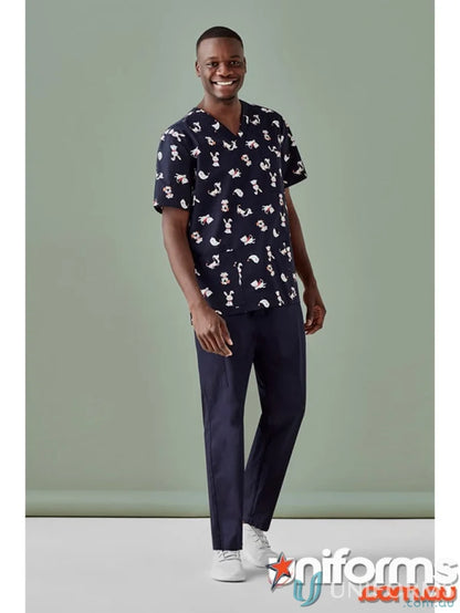 Smiling man in patterned men’s scrub top perfect for early childhood educators and allied health pros