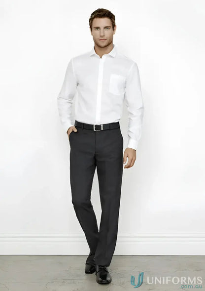 Man in white shirt and dark pants showcasing Mens Flat Front Pant fit and measurements