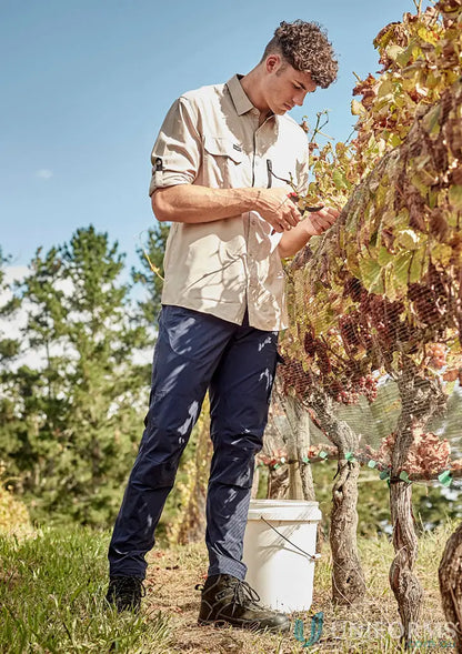 Man harvesting grapes in Mens Lightweight Outdoor Pant with large cargo pocket for ultimate comfort