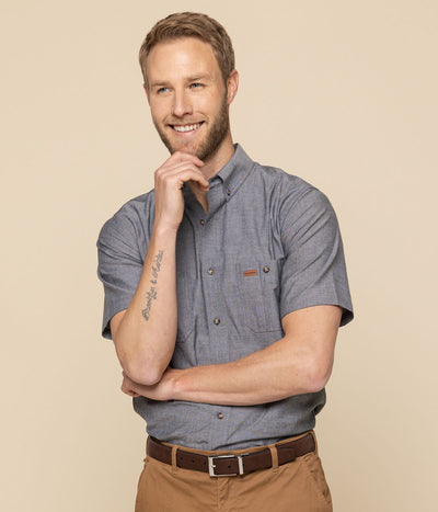 Gray short sleeve industrial chambray shirt with orange suede pen pocket