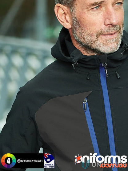 Man wearing Mens Sidewinder Shell with chest pocket and articulated hood outdoor jacket