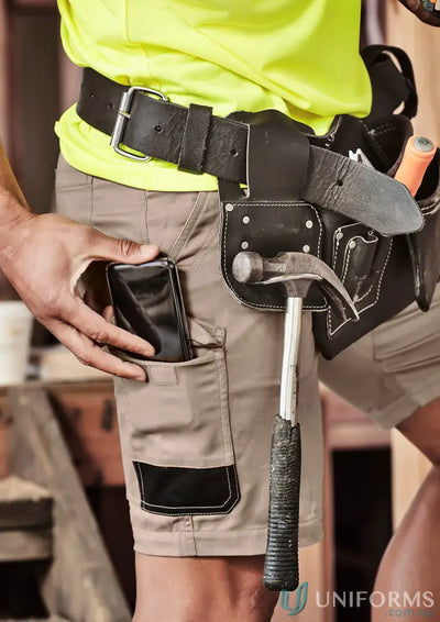Construction worker’s tool belt and shorts on Mens Summer Cargo Short model perfect for summer cargo style