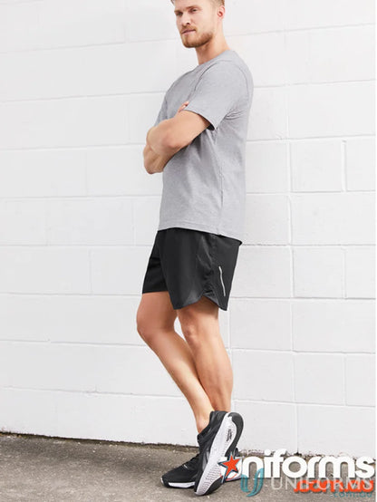 Man wearing Mens Tactic Shorts with mesh panels and st511m fit in athletic apparel