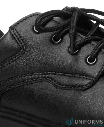 Close-up of black leather Microfibre Lace Up Steel Toe Shoe laces and eyelets for workwear