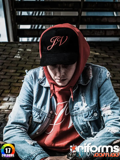 Man in denim jacket and hoodie with MOQ100 Brushed Cotton Cap, embroidery included
