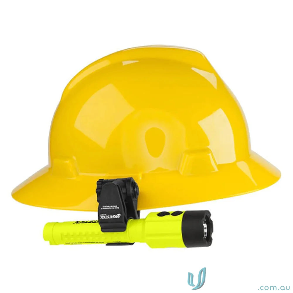 Yellow hard hat with flashlight mounted on helmet mount for accessory slot or brim