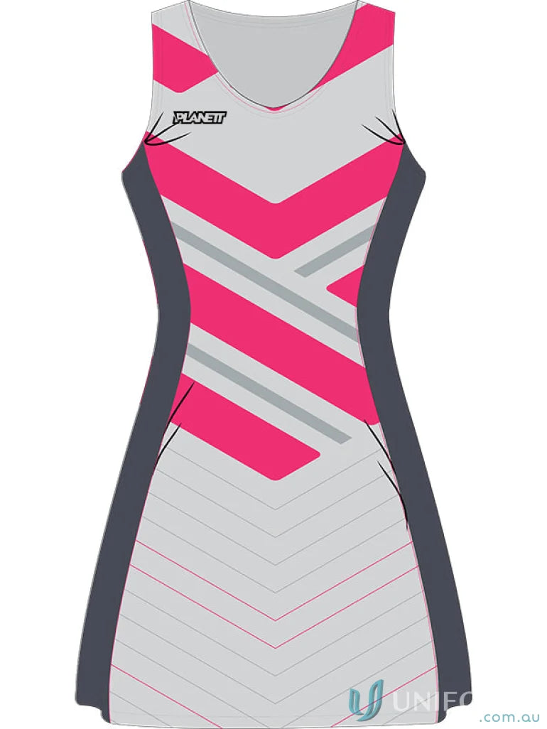 Sleeveless netball dress with pink and gray chevron pattern made from custom sublimated sports fabric