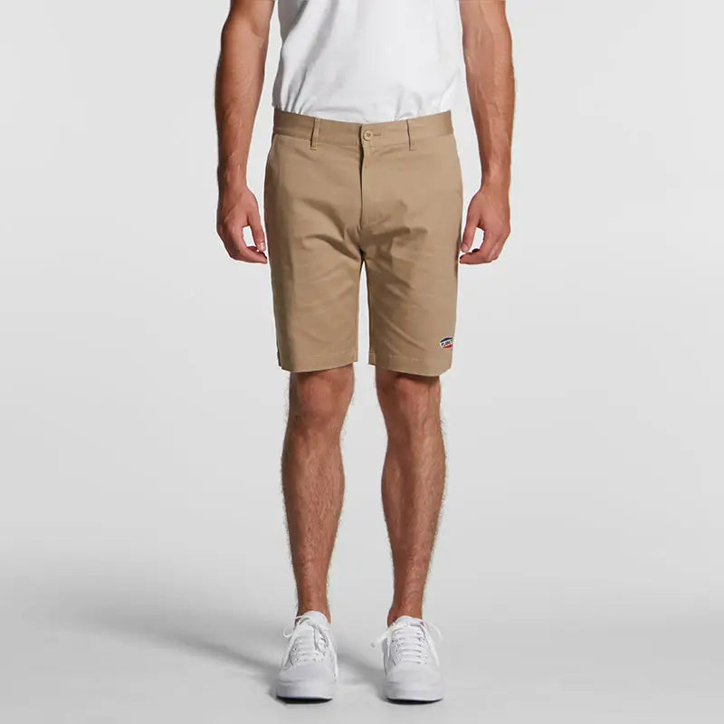 Khaki cotton blend Nemesis Ramp Shorts with white logo on left leg