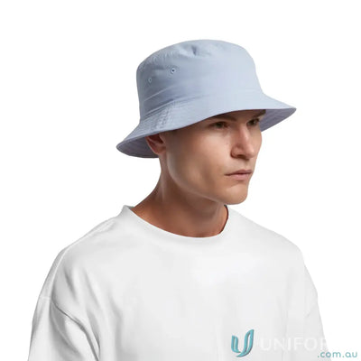 Light blue nylon bucket hat on person, lightweight quick-dry recycled nylon style