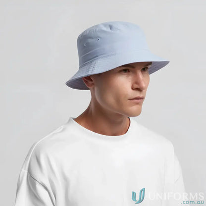 Light blue nylon bucket hat on a person, quick-dry recycled nylon design