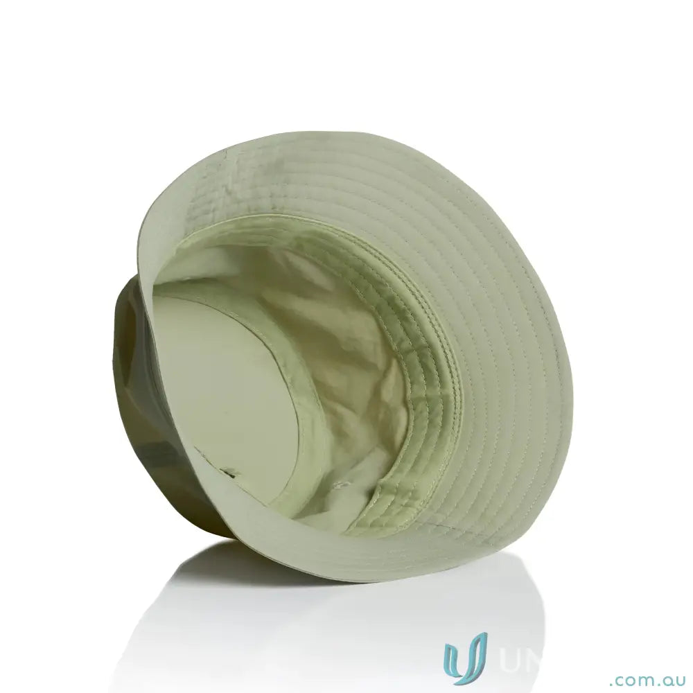 Light green nylon bucket hat with wide brim, visible stitching, quick-dry recycled nylon