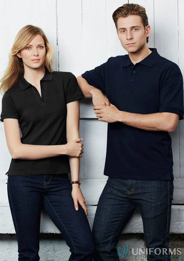 Two women showing off the oceana polo and jeans for effortless style