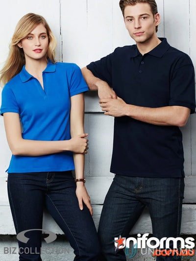 Two people rocking women’s Oceana Polo shirts and jeans for effortless style