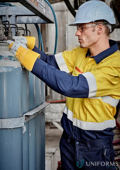Worker in safety gear adjusting gas cylinders wearing Orange Flame Lightweight Ripstop Spliced Hoop Shirt in demanding work environments