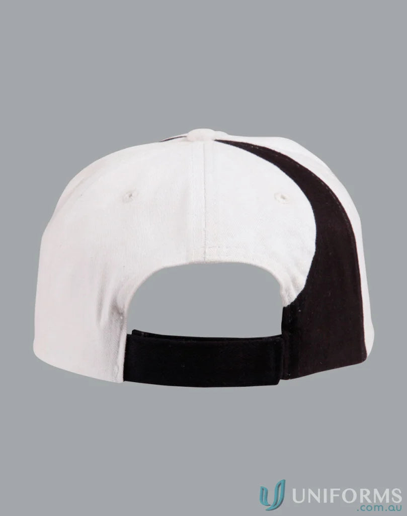 White and black peak crown contrast cap with red white accents for a stylish look