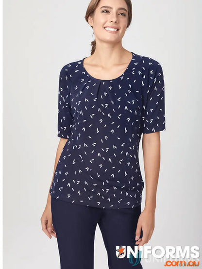 Navy patterned short-sleeved top from Petal Print Knit city collection made with recycled polyester