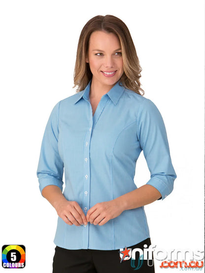 Woman modeling Pippa Check light blue princess line workwear shirt with three-quarter sleeves