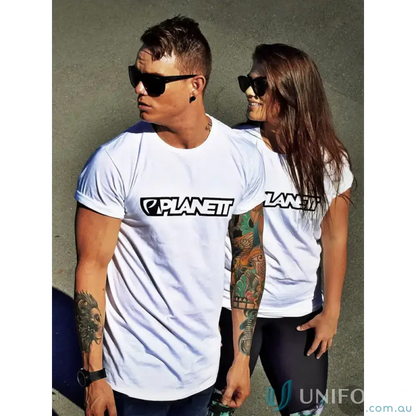 Two people wearing matching white planett classic tee with black logo, comfy combed cotton classic shirt