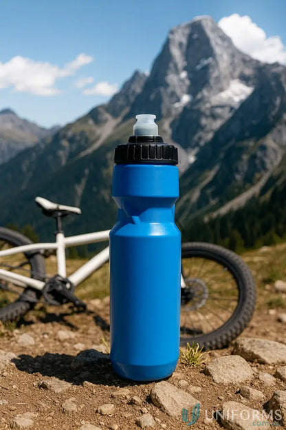 Blue plastic bike bottle with black lid, ideal for Camelbak Podium or uniforms