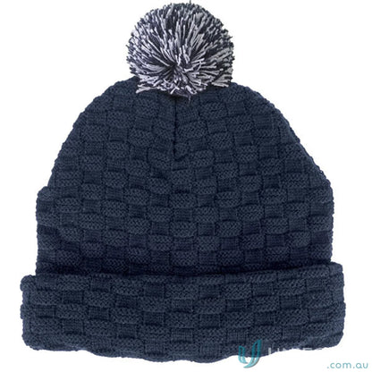 Navy blue pom pom beanie made with double layer knit, perfect for cold days