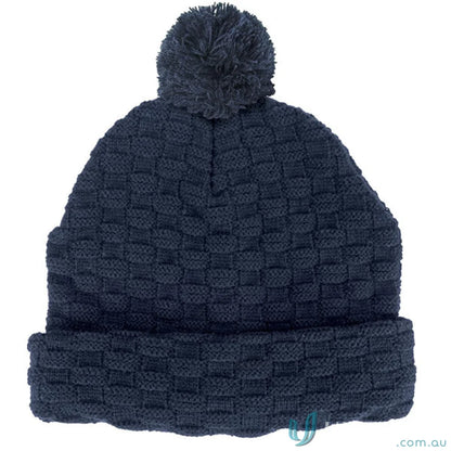 Blue Pom Pom Beanie with double layer knit, cozy winter gear from our marketing info sheet