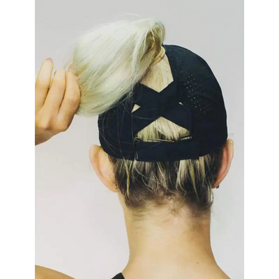Black mesh ponytail active cap showing adjustable strap and back panel design ideal for workwear uniforms