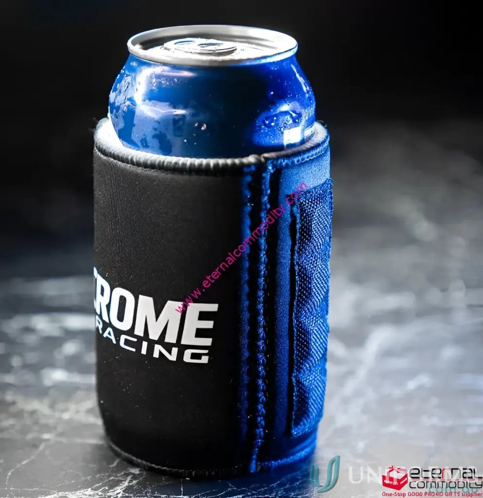 Black magnetic stubby holder with blue trim and textured pocket holding a cold blue can