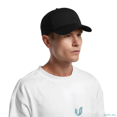 Man in white t-shirt and black baseball cap with curved peak and plastic snapback