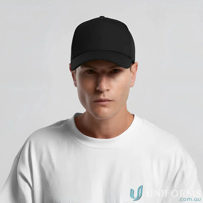 Man in black baseball cap with curved peak and plastic snapback, premium cotton material