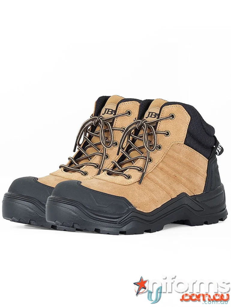 Pair of tan Quantum Sole Safety Boots resistant to work uniforms and tough conditions