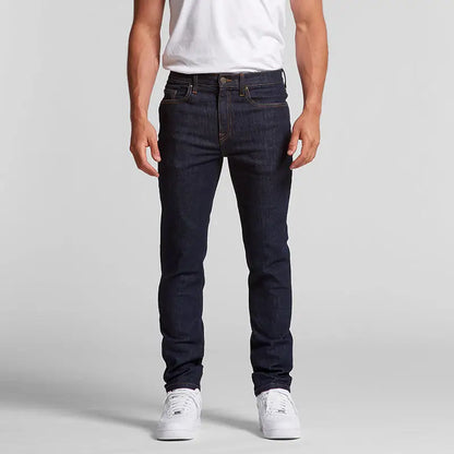 Dark wash slim fit raw indigo denim jeans with white stitching by Target