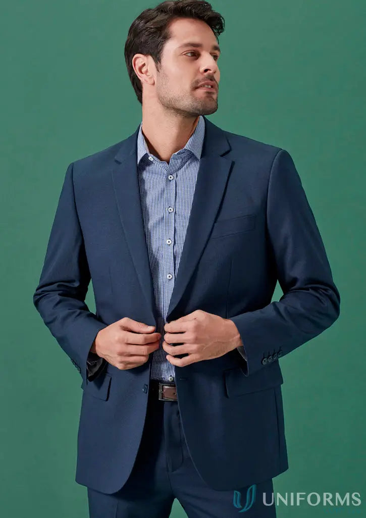 Man in navy blue Renew City Fit Jacket with recycled polyester for hospitality teams