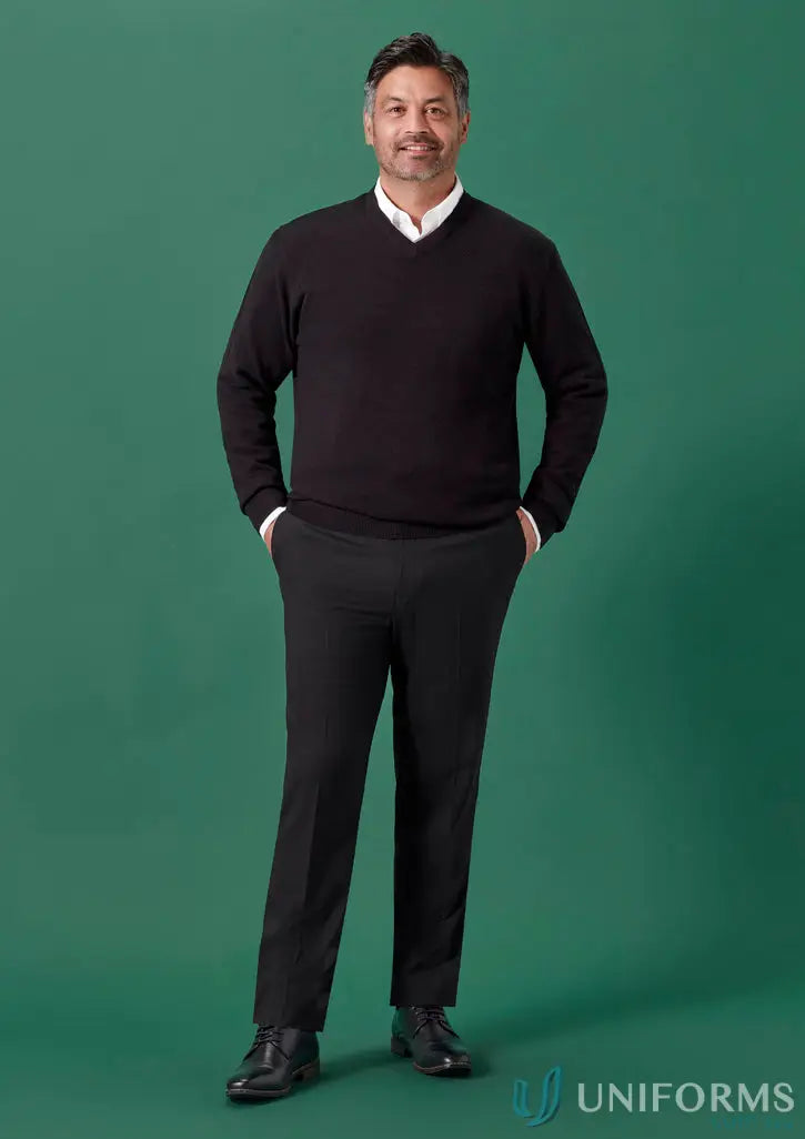 Man in black Renew Slim Fit flat front pant made from recycled polyester for corporate wear