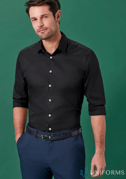 Man in black dress shirt and blue Renew Slim Fit Flat Front Pant for corporate styles